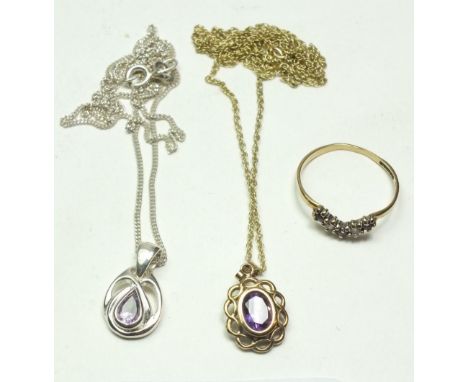 A yellow metal amethyst and cubic zirconia pendant and a silver and amethyst pendant necklace and a 9ct gold dress ring 