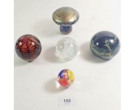 A selection of five paperweight to include an iridescent mushroom weight, a Mdina, a Caithness, a Teign Valley glass ltd. ed 