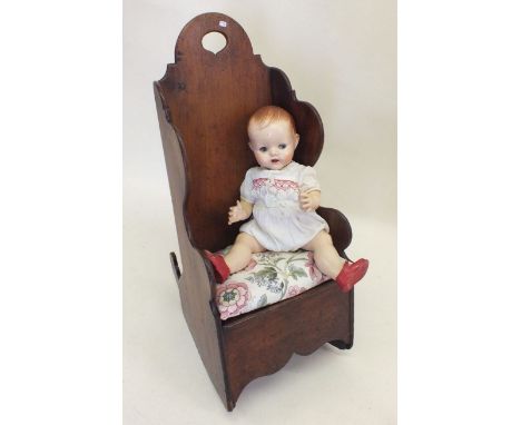 A Victorian mahogany child's lambing chair with commode seat 