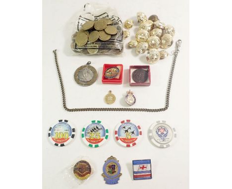 A box of tokens, enamel badges and military buttons.