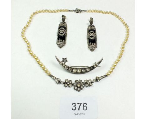 A pair of silver and marcasite earrings, a silver and paste crescent brooch and a similar pearl and paste necklace 