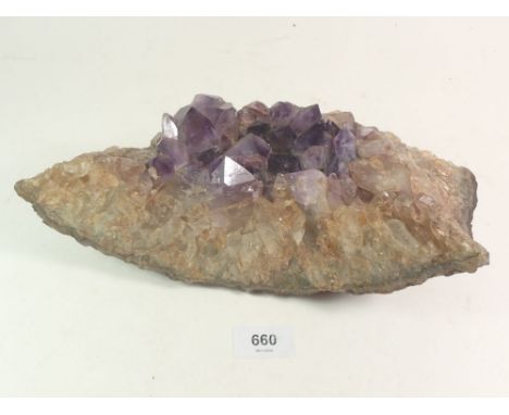 A large amethyst crystal, 27cm long 