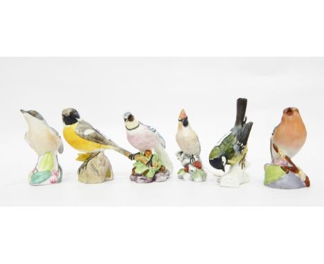 Four tinted bisque Royal Worcester models of birds and a Staffordshire and Goebel model (6) 