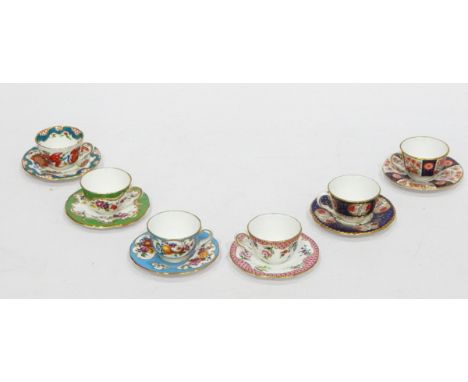 Six various boxed Royal Worcester miniature cups and saucers including 'Jabberwocky', 'Wheatsheaf', 'Marchioness of Huntley',