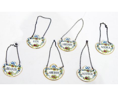 Set of six Crown Staffordshire wine labels for brandy, gin, vodka, scotch and two sherry, decorated with flowers and garlands