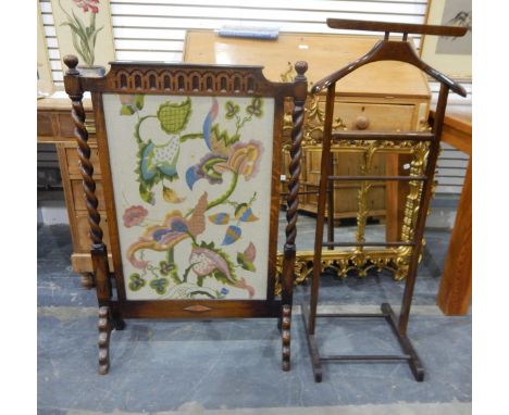 Early 20th century oak-framed firescreen with woolwork embroidered panel and on spiral turned supports and a gentleman's vale