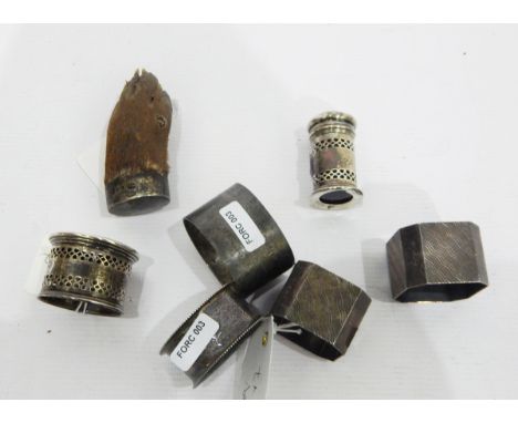 Pair of silver napkin rings of square design, with engine-turned sunburst decoration, inscribed 'Joan and Donald', two other 