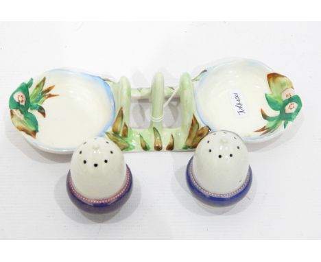 Clarice Cliff pottery toast rack-cum-preserve dish and a pair of Moorcroft acorn-shaped lustre pepperettes (3) 