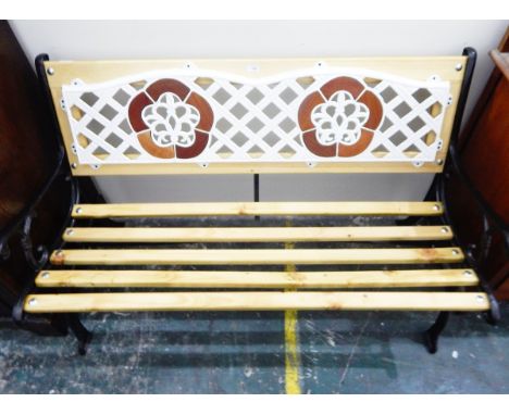 Slatted garden bench seat with decorative painted iron trellis panelled back, on painted metal standards 