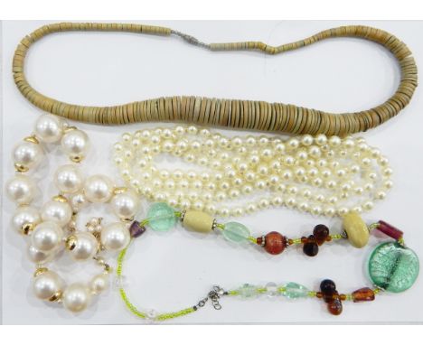 Large quantity of costume jewellery including simulated pearl necklaces, glass bead necklaces, etc. 