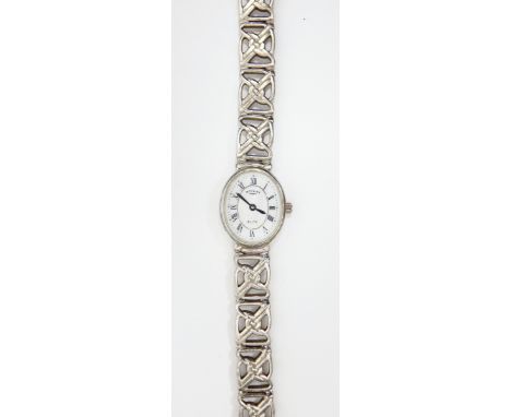 Lady's silver Rotary Elite bracelet watch with oval mother-of-pearl dial and integral Celtic knot-design bracelet