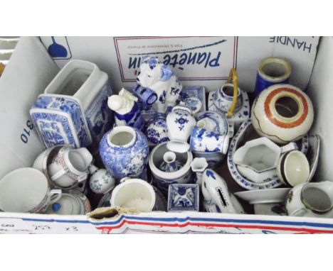 Large quantity of ceramics including blue and white, a model of a rabbit, model of a St Bernard dog, various small vases and 