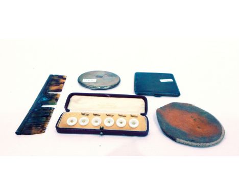 Silver cigarette case of engine-turned square form, a silver metal compact, a silver-mounted comb and a set of mother-of-pear