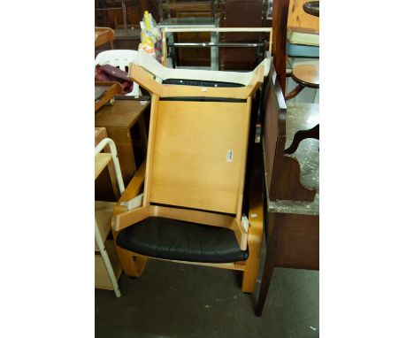 AN IKEA ARMCHAIR WITH PAD BACK AND SEAT AND A MATCHING POUFFE AND A SIMILAR POUFFE 