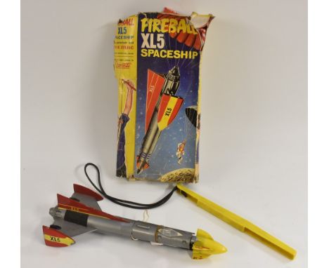 A Quercetti (Italian) 1960s Fireball XL5 Spaceship rocket, with two parachutes, slinger launcher (rubber perishing) and origi