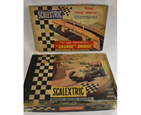 Scalextric Slot Car Racing - a GP.33 set, inc yellow Lotus MM/C63 and Green Ferrari MM/C62 racing cars, pump controllers, tra