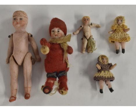 Dolls - a trio of tiny miniature bisque porcelain dolls, fixed heads, moveable limbs, smallers approx 31mm long;  others larg