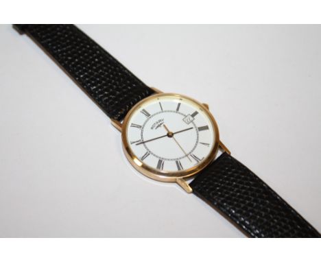 A YELLOW METAL ROTARY DATE WRISTWATCH