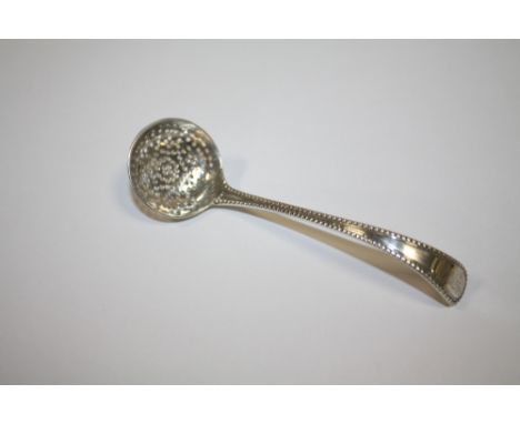 A HALLMARKED SILVER SIFTER SPOON