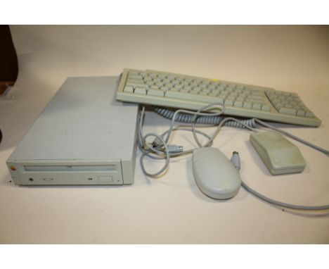 A 1991 APPLE CD 150, APPLE KEYBOARD II, APPLE DESKTOP BUS MOUSE AND DESKTOP BUS MOUSE II (4)