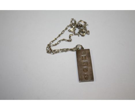 A HALLMARKED SILVER INGOT ON CHAIN 
