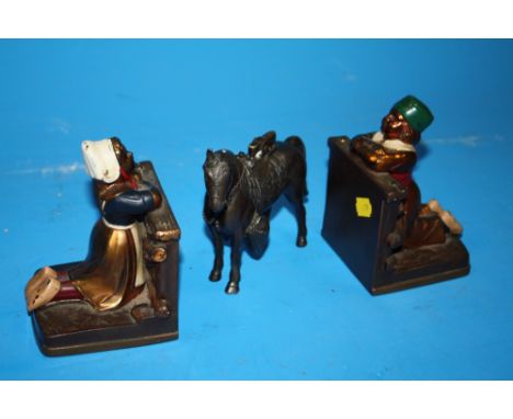 A TABLE LIGHTER IN THE FORM OF A HORSE TOGETHER WITH A PAIR OF METAL RONSON BOOKENDS