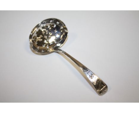 A HALLMARKED SILVER SIFTER SPOON