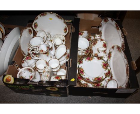 TWO TRAYS OF ROYAL ALBERT OLD COUNTRY ROSES CHINA TO INCLUDE TEA AND COFFEE POTS, CUPS AND SAUCERS, MEAT PLATES ETC. 