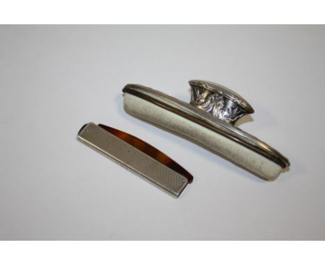 A VINTAGE HALLMARKED SILVER FOLDING COMB, TOGETHER WITH A FRENCH SILVER NAIL BUFFER  