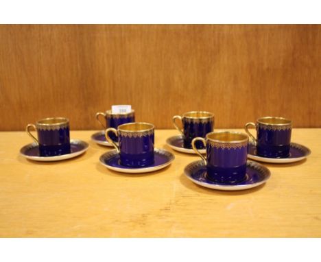 A SET OF SIX CROWN DEVON FIELDINGS 1025&nbsp;BLUE AND GILT&nbsp; COFFEE CANS AND SAUCERS