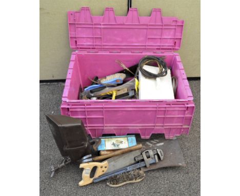 A collection of assorted tools to include a wire brush, hammer, wrench and other items