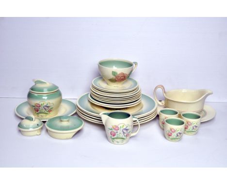 A Susie Cooper part service in the 'Patricia Rose' design (cup and two saucers); and assorted in the 'Dresden Spray' design