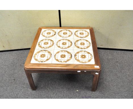 A G-plan tile topped coffee table, 38cm x 72cm square