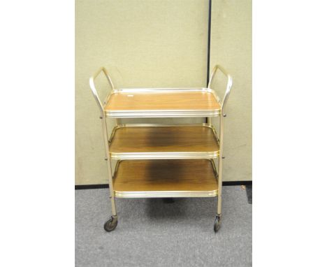 A vintage gilt tea trolley, three tiered, 76cm high