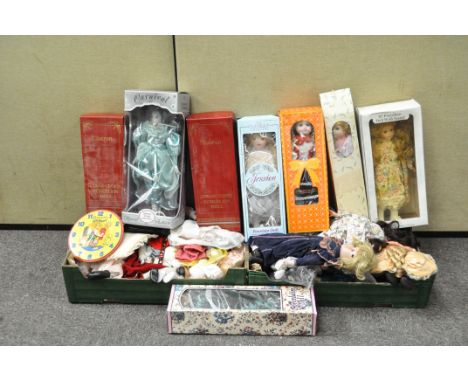 Three boxes of collectors dolls, some boxed, some with stands and a Bassets Jelly Babies wall clock