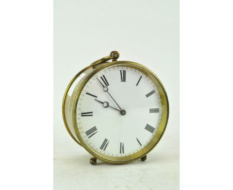 A French mantel clock, of circular form, the movement stamped Brevete, 10cm high