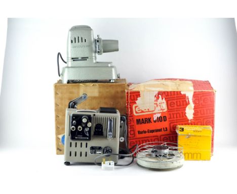 A group of three vintage projectors, including an Aldis aspheric and Eumig wein type P8, all boxed