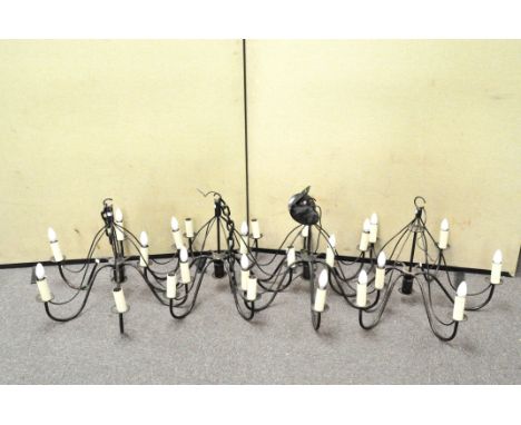 A set of four six light chandeliers, 80cm diameter