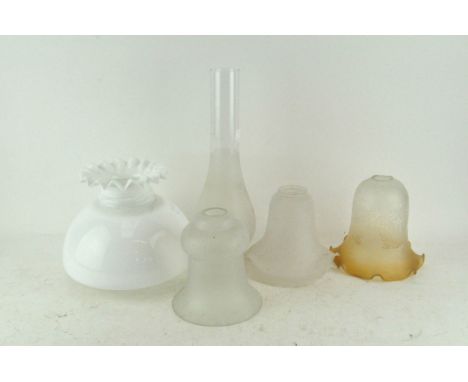 Four frosted and milk glass oil lamp shades and a frosted flue, shades 21cm high and smaller