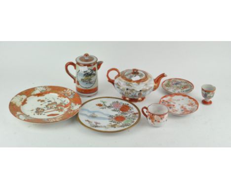 A selection of Japanese satsuma porcelain, including plates, teapot and more