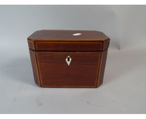 A 19th Century Mahogany Tea Caddy with Boxwood Stringing.