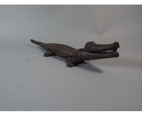 An Iron Crocodile Nut Cracker by Nestor Birmingham 40 Cm Long.