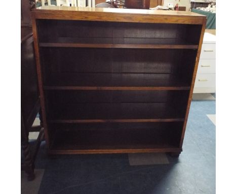 An Oak Four Shelf Open Bookcase.