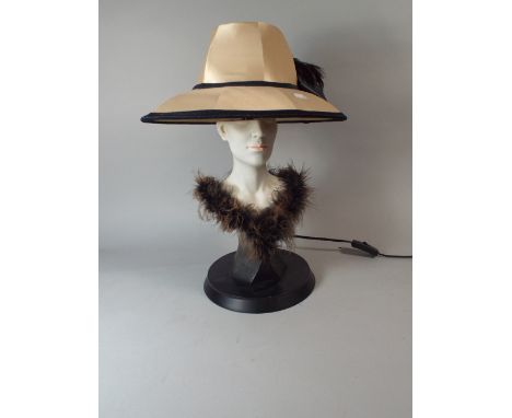 A Modern Table Lamp in The Form of Girl Wearing Hat, 47 Cm High.