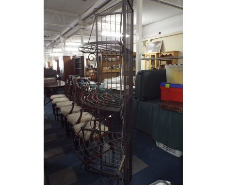 A Wrought Iron Corner Garden Shelf Rack, with Four Shelves, Two Metres High.