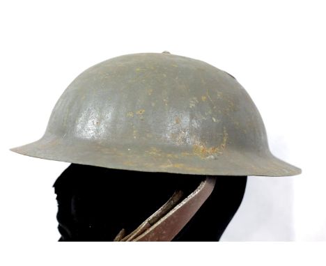 British WWI style steel helmet with liner. P&amp;P Group 2 (£18+VAT for the first lot and £2+VAT for subsequent lots) 