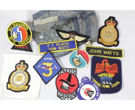 Various cloth badges, flying hat and RAF wings, all relating to jet pilot John Watts, of the University of London Flying Scho