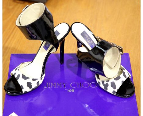 Pair of Jimmy Choo ladies shoes, size EU 38 with storage bag. P&amp;P Group 2 (£18+VAT for the first lot and £2+VAT for subse