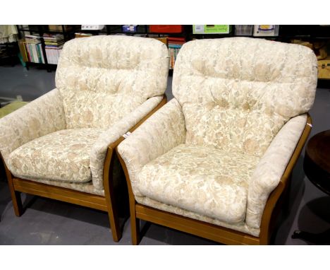 Pair of Ercol upholstered armchairs. This lot is not available for in-house P&amp;P.
Condition Report: Some minor use wear bu