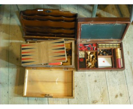 An Edwardian walnut stationery stand, together with two 19th century boxes, each converted to a games compendium containing c